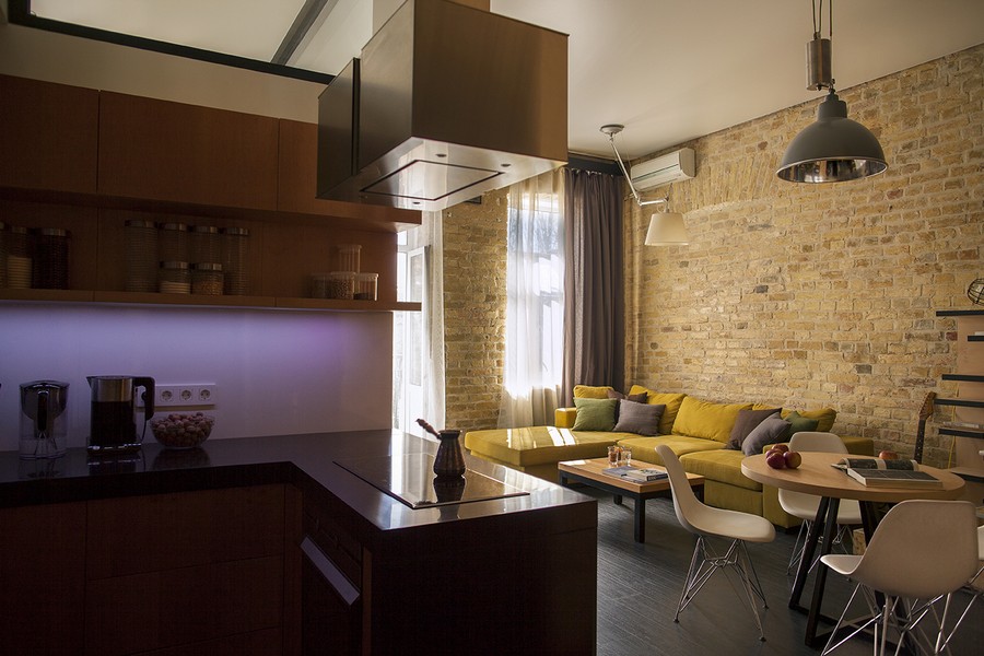 Bold yellow couch in the living area