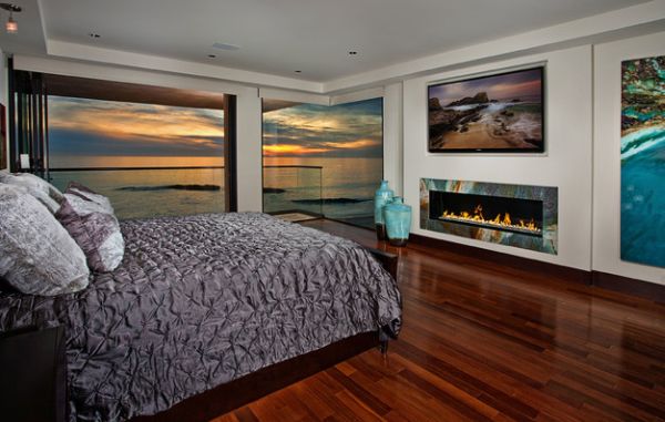 Colorful trim around the bedroom fireplace is only outdone by the amazing view outside