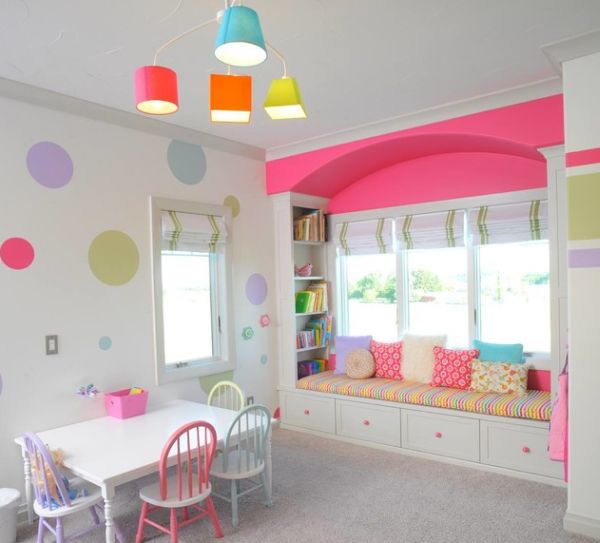 Cool lighting goes along with the shades used in the girsl' playroom