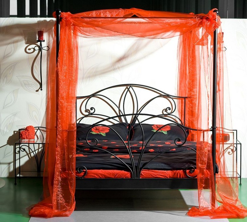 Delazious wrought iron canopy bed with black and orange Halloween look