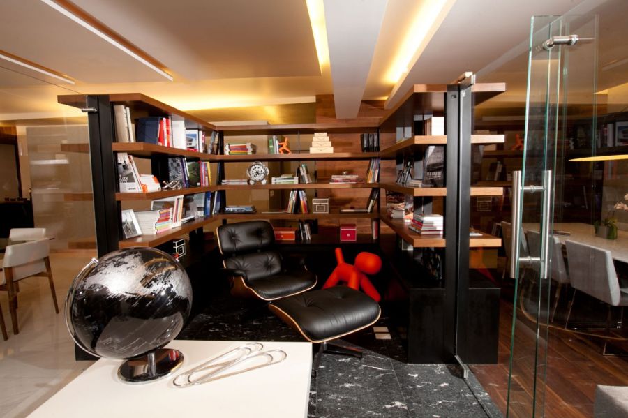 Eames Lounger at the heart of the small home library