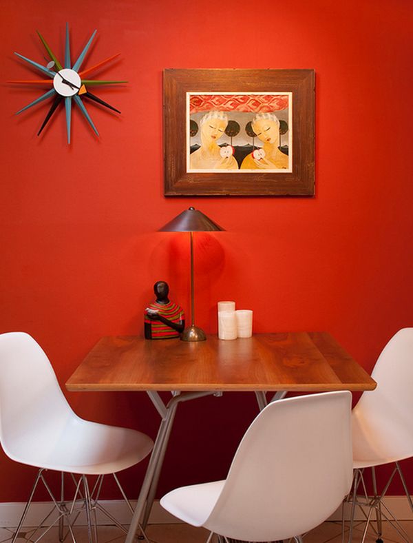 Eccentric dining space proudly showcases the George Nelson Sunburst Clock