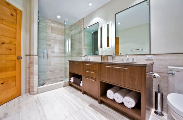 Elegant display with neatly folded towels in the built-in cabinets of the vanity