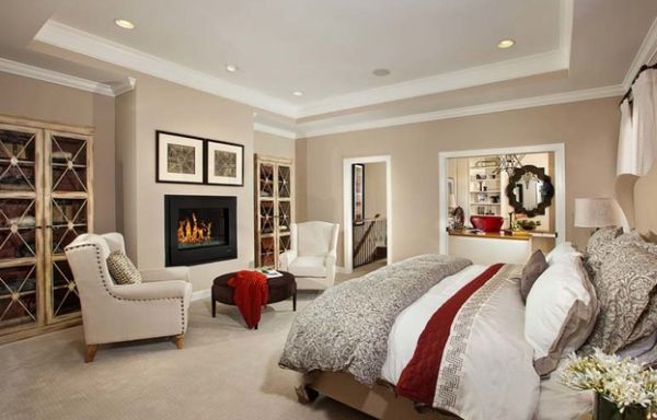 Fabric in red set against white goes along with the charming fireplace!