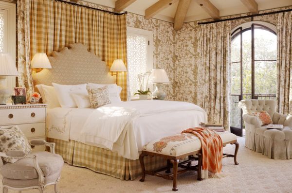 Golden yellow hues dominate this luxurious bedroom