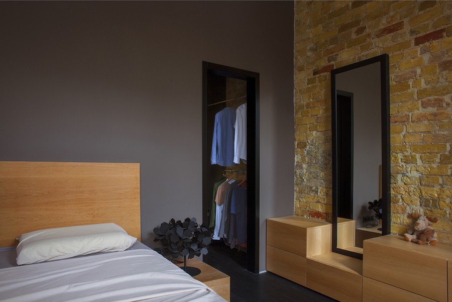 Open closet and mirror in the bedroom