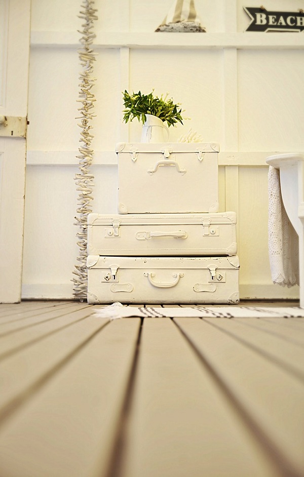 Painted white vintage suitcases