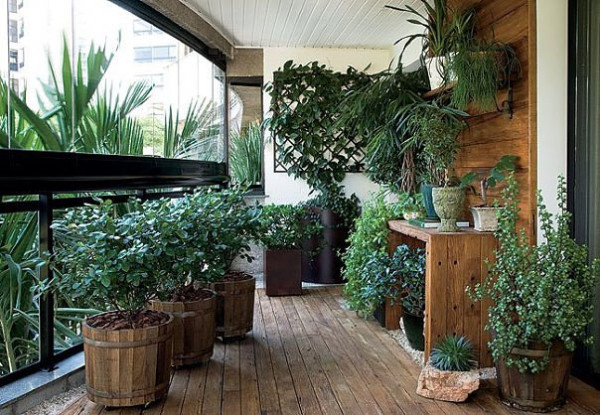 Plants on a balcony with wooden details