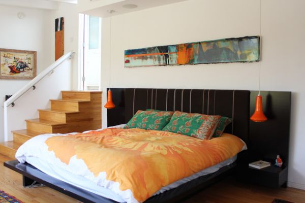 Pops of orange always create a vibrant bedroom