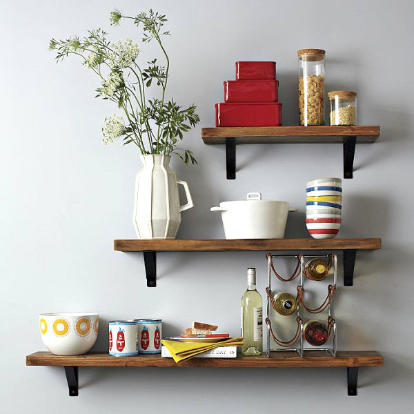 Practical and decorative items on kitchen shelving