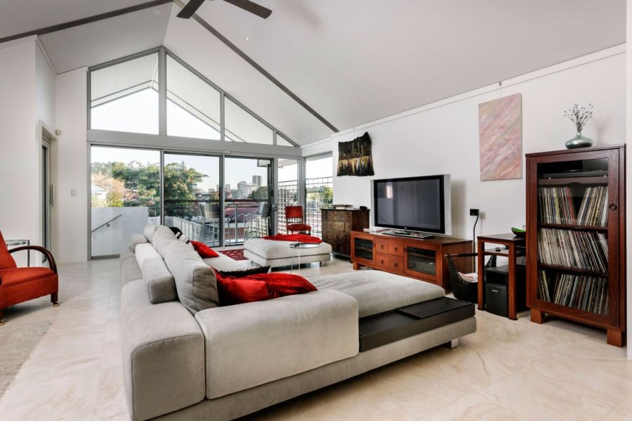 Red accents splurged around the living room