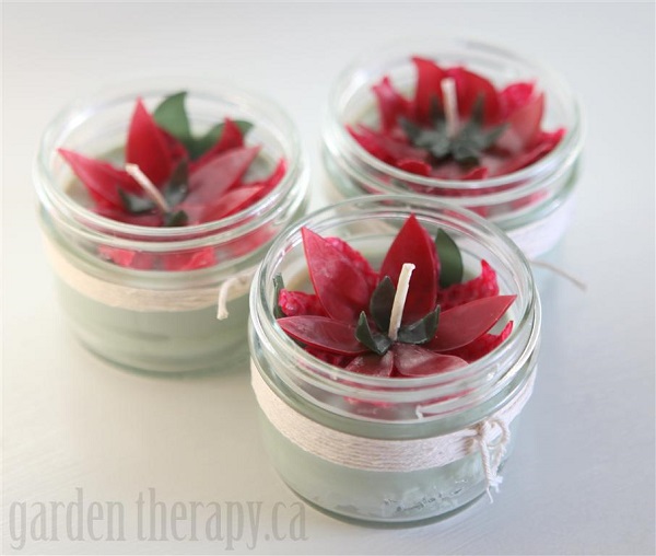 Red and green poinsettia candles