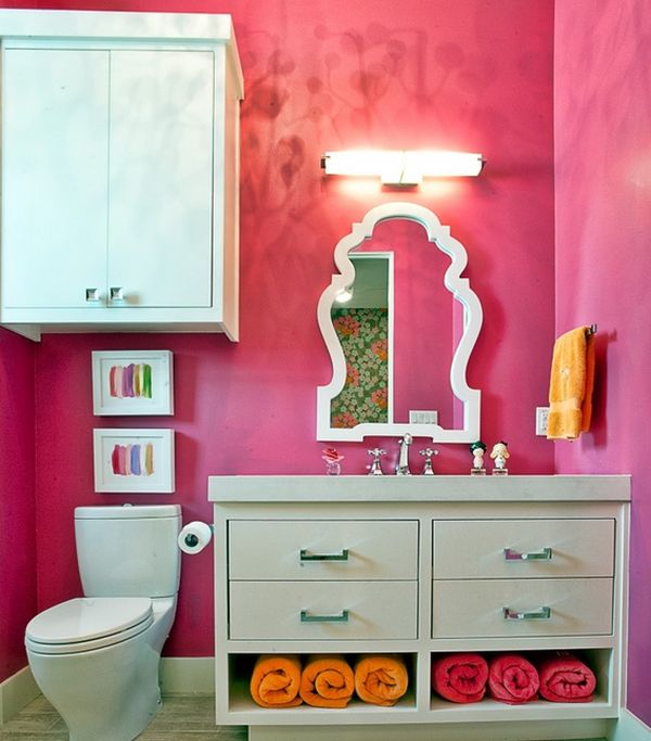 Rolled and hung towels reinforce the exquisite color scheme of this bathroom