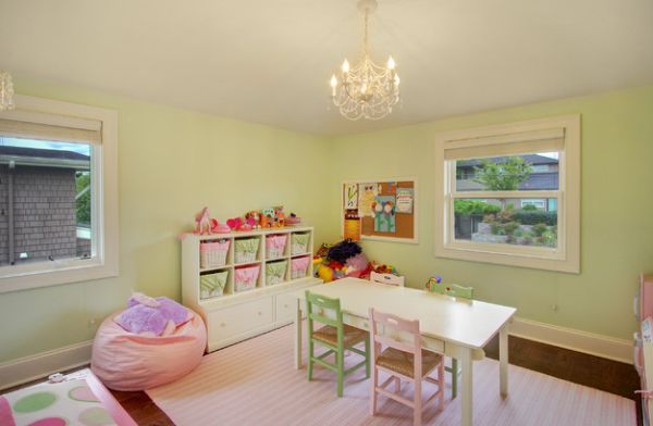 Soft hues of pink and green combined in the playroom