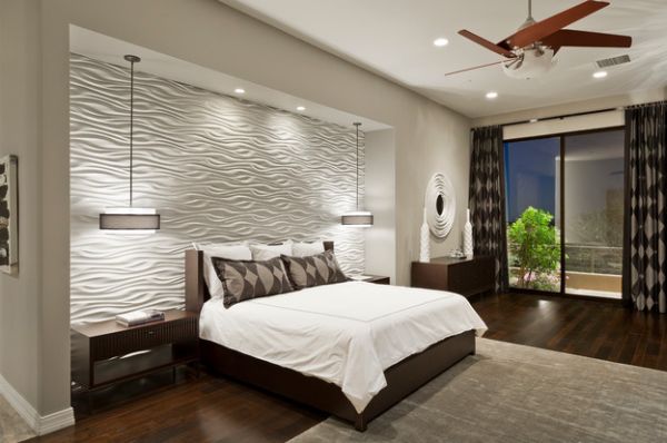 Stunning contemporary bedroom with a perfectly lit textured wall