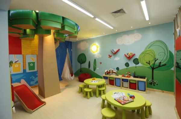 Wall murals add distinct character to the playroom