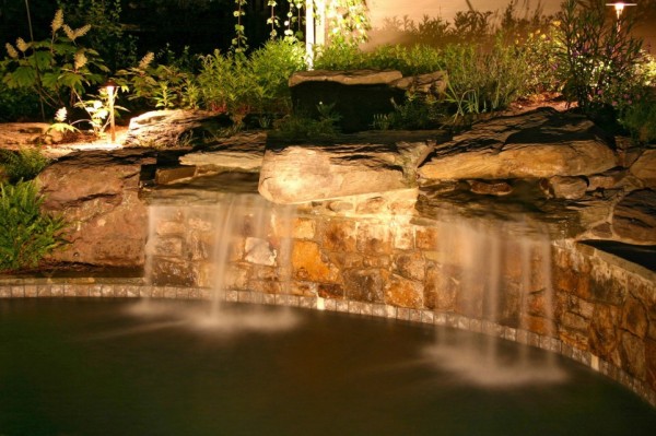 water feature and garden lighting with pond