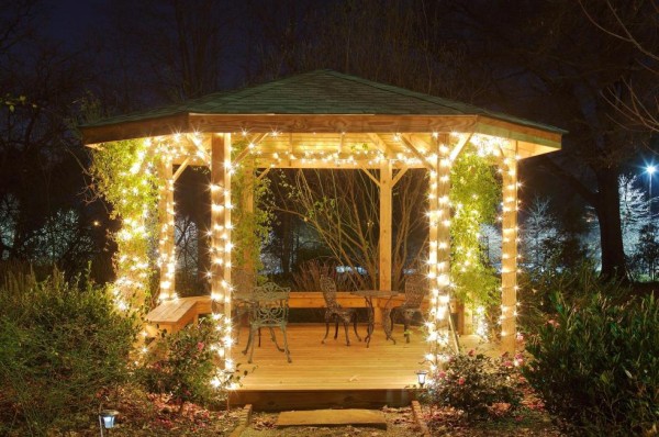 bright garden gazebo shines at night