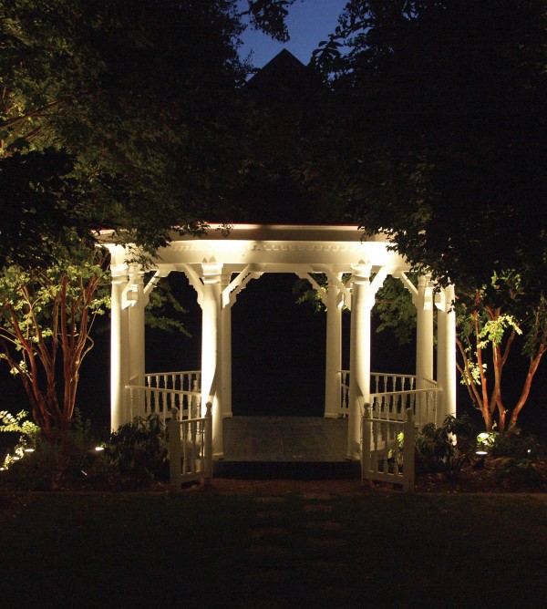 well lit gazebo in garden