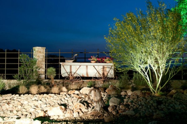 garden lighting with old wooden wagon