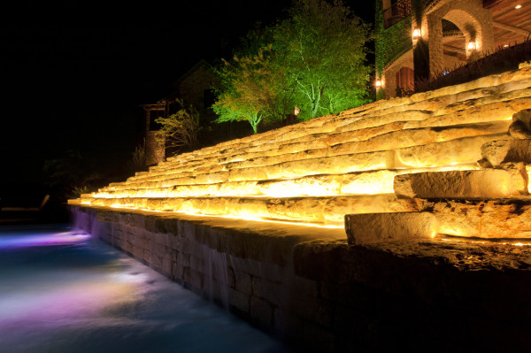 automated lighting on garden waterfall