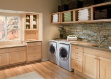 Beautiful-laundry-room-with-ample-storage-and-shelving-room-217x155