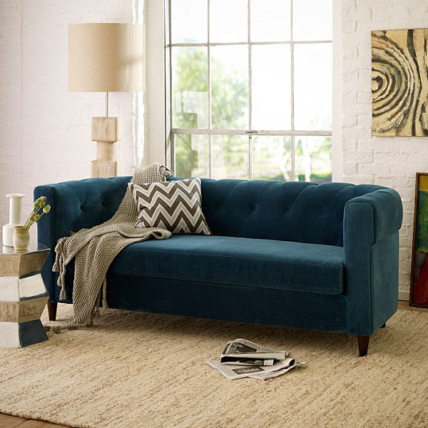 Blue upholstered sofa