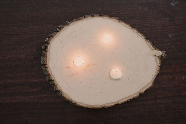 Candle holder made from cross section of wood