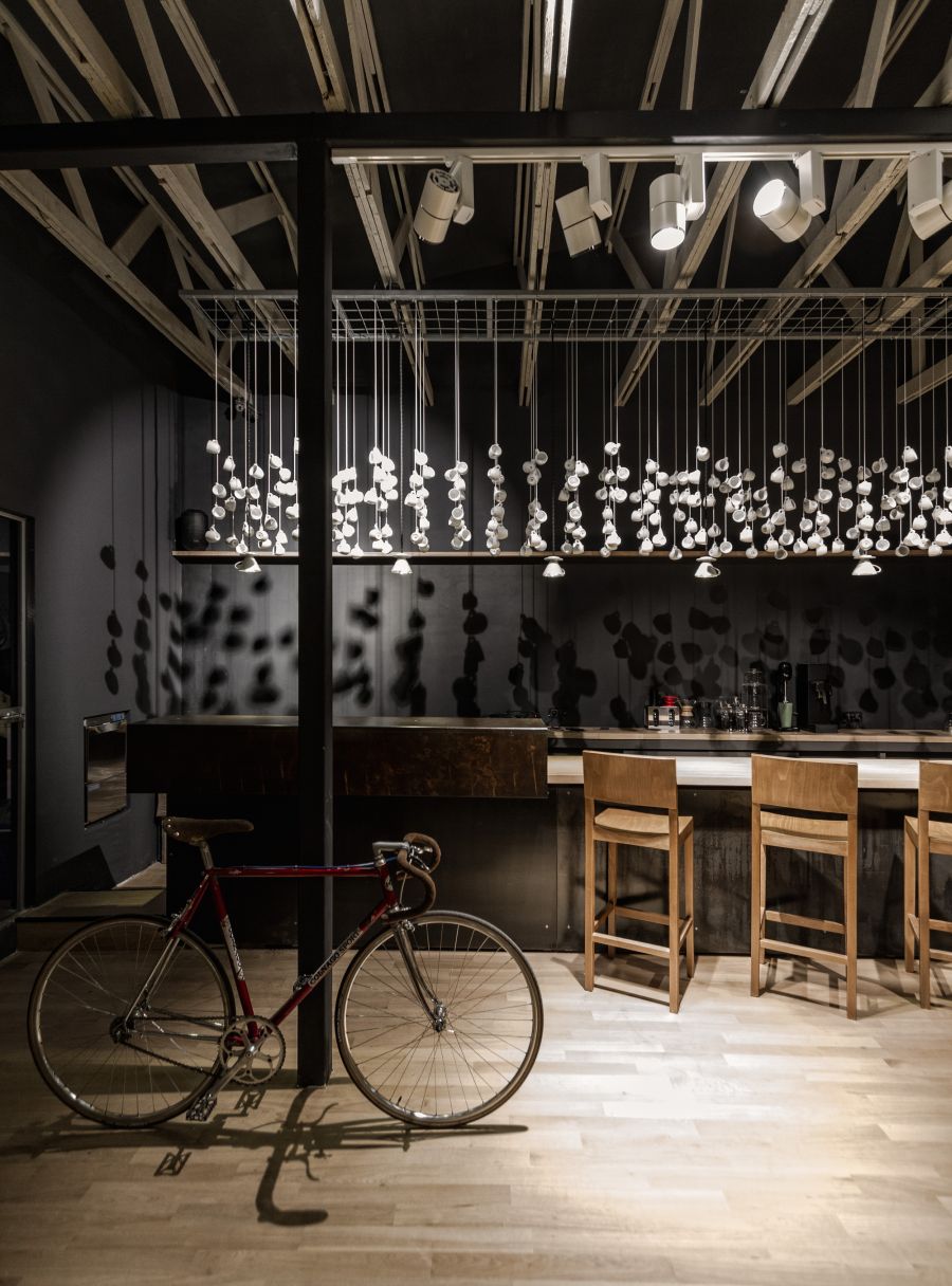 Cantilevered bar with folded Corten steel at the end