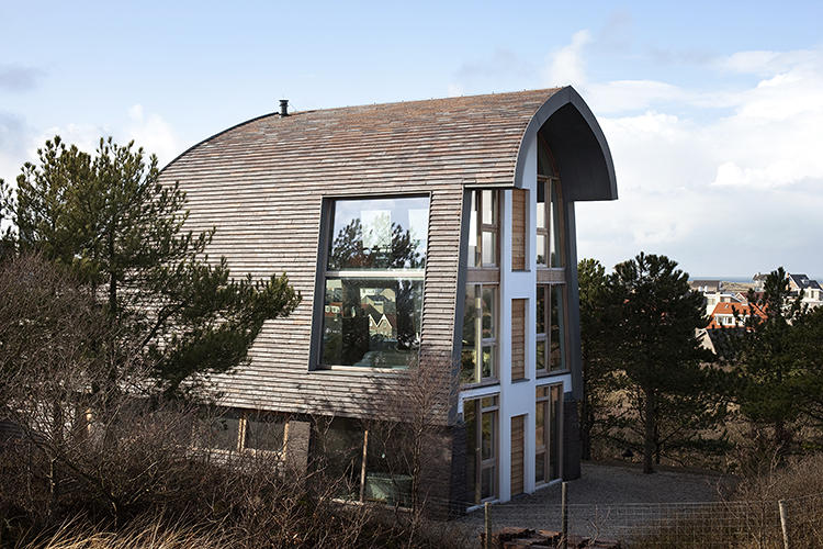 Clay tiled exterior of the Dune House