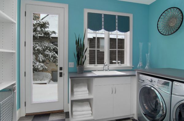 Cool turquoise combined with pristine white in the modern laundry room