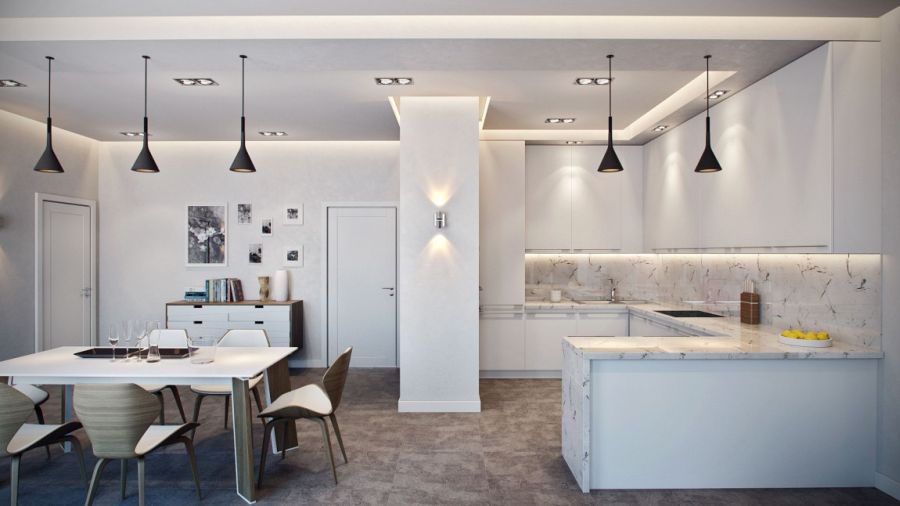 Dark pendant lights in a light and airy kitchen