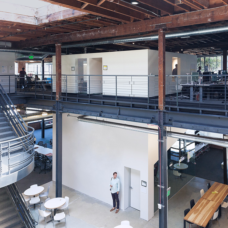 Exposed ceailing beams and steel railing