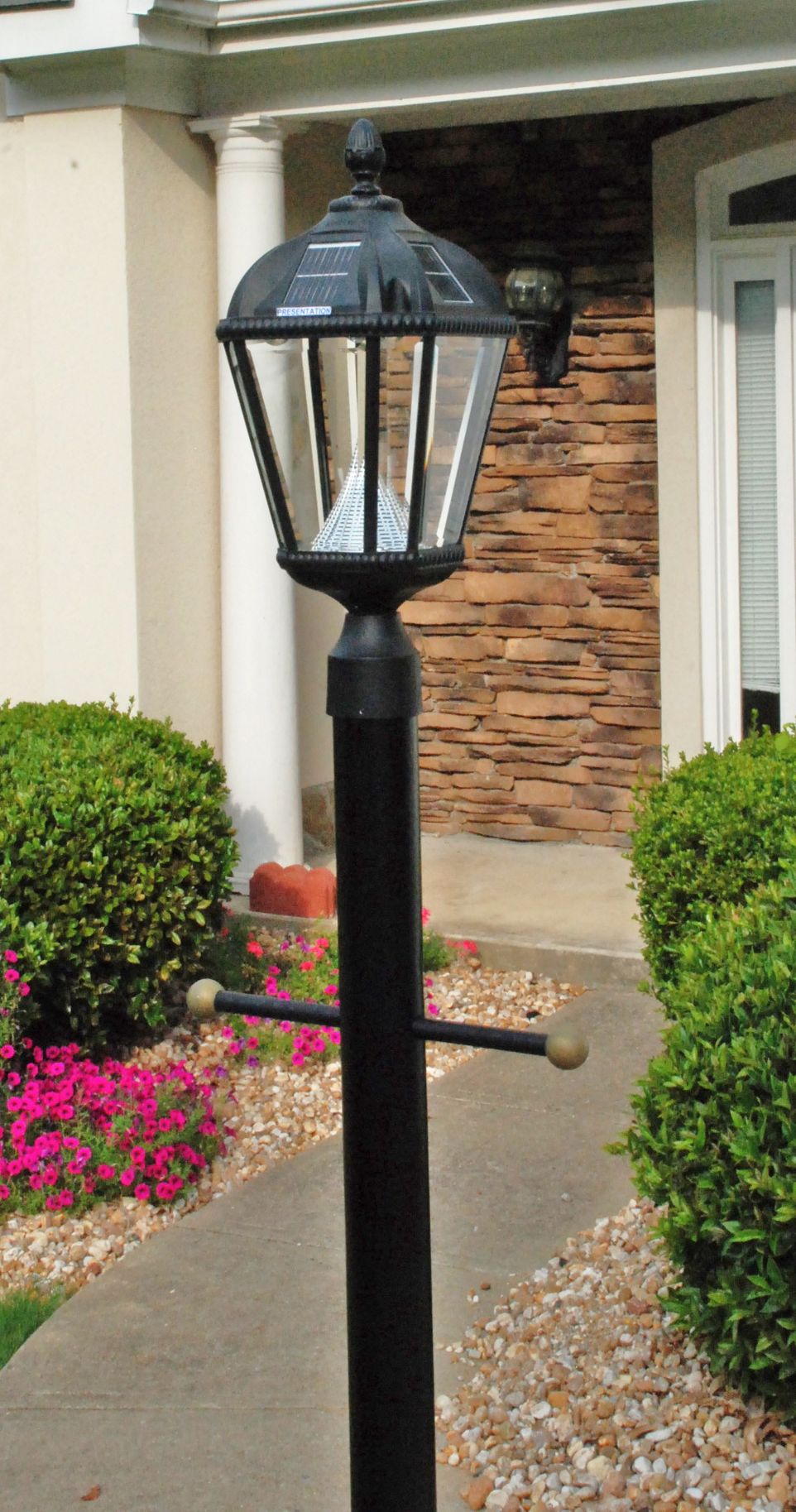 Light post outside home powered by the sun