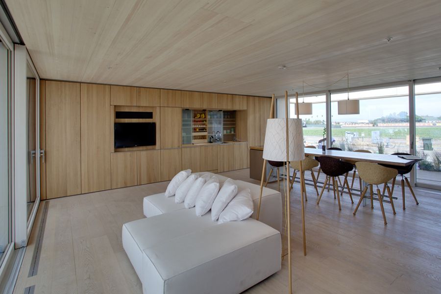 Lovely living room of sustainable solar home from Team Austria