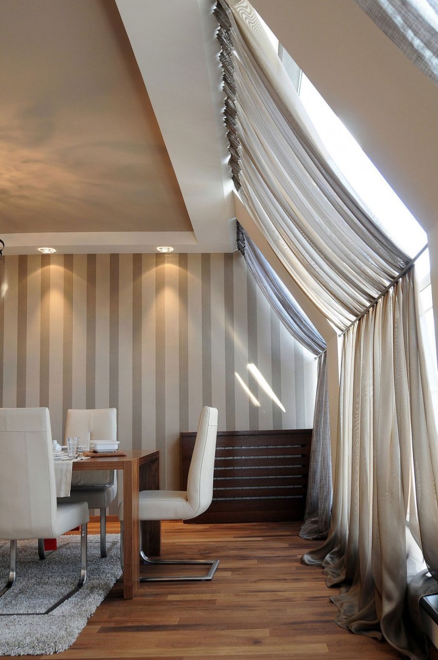 Lovely use of drapes in the dining space