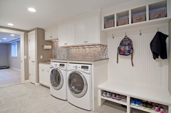 Mud room and laundry combo with a lovely backsplash and cool shelves