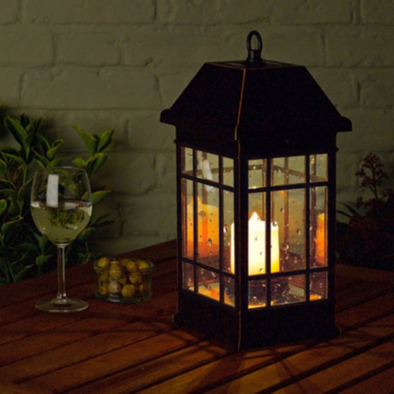 Solar powered table lantern with LED candle