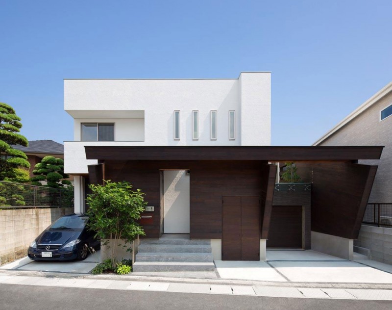 Minimalist Japanese Residence Blends Privacy With An Airy Interior   Street Facade Of House Of Corridor 