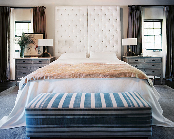 Upholstered headboard in a cozy bedroom