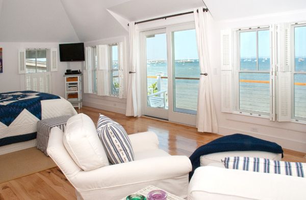 View outdoors adds to the beach style inside the bedroom