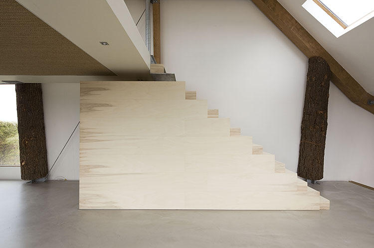 Wooden staircase leading to the bedrooms