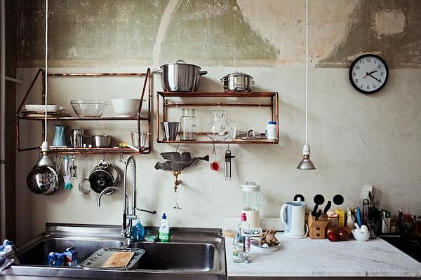 exposed copper pipes as shelves