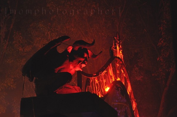 scary gargoyle lit with orange light