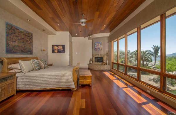 Beautiful bedroom with unabated views and a fireplace in the corner