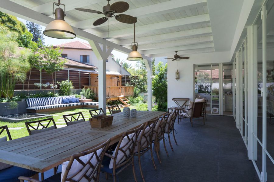 Beautiful pergola with dining space connected to the backyard