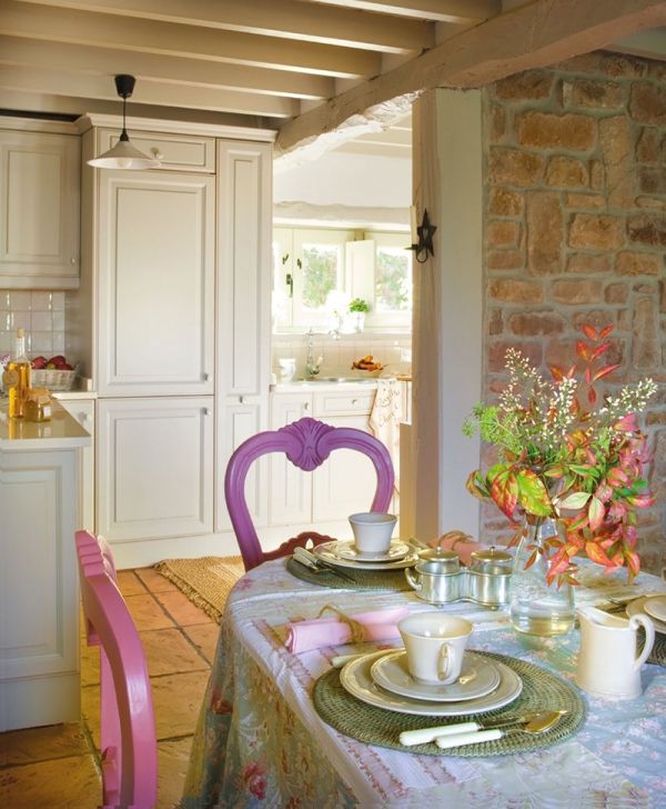 Beautiful purple and pink chairs at the dining table