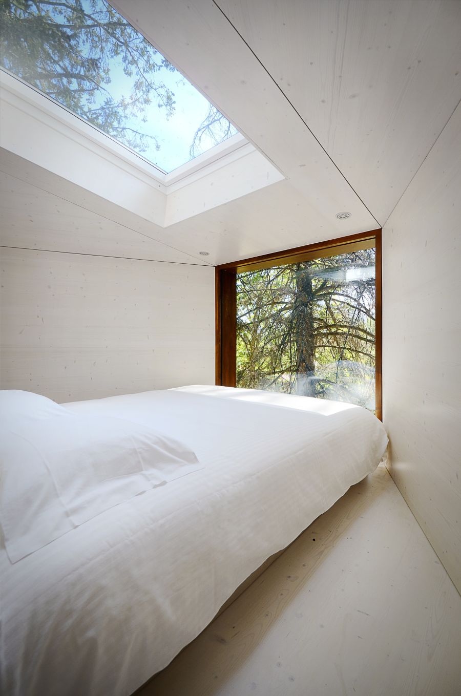 Bedroom inside the tree house at  Pedras Salgadas Park