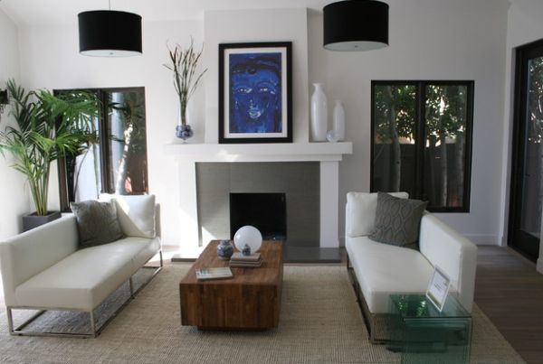 Black drum pendants add drama to the bachelor pad