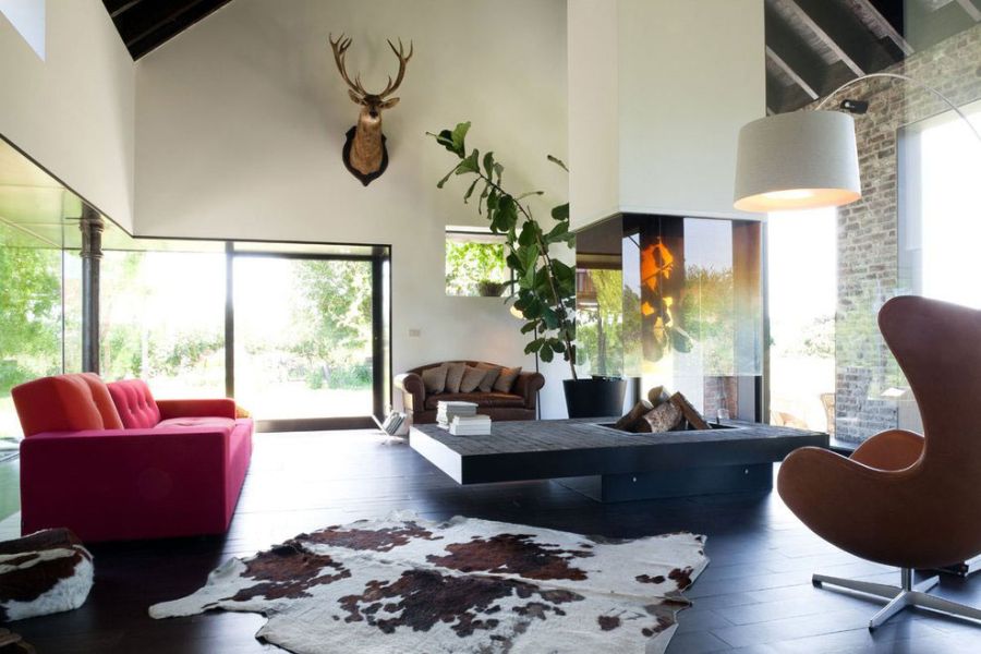 Contemporary fireplace inside the classic house